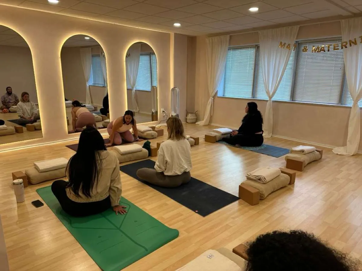 Smiling participants after a yoga class
